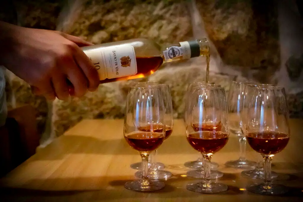 Port wine bottle being served in Port Wine Glasses by Bernardo Providência, our host and Sommelier.